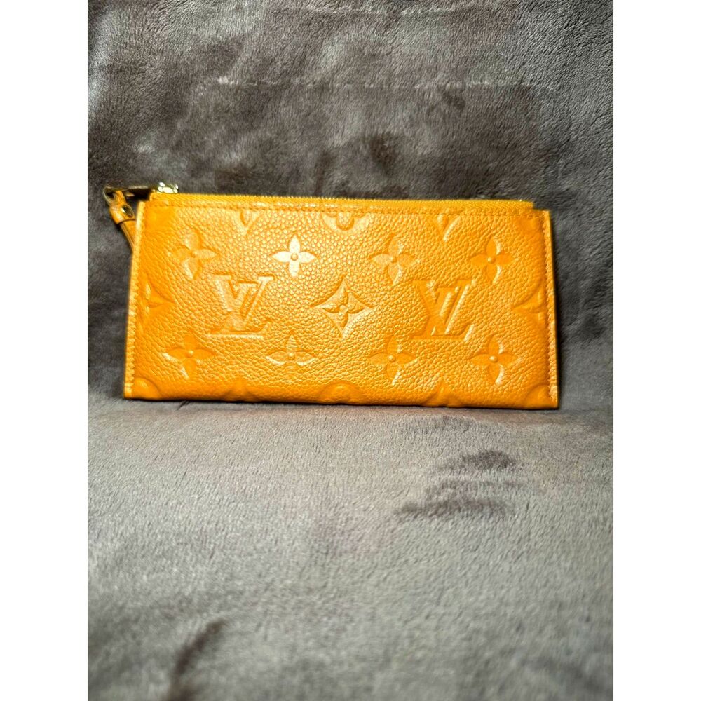 Louis Vuitton Pouch Empreinte Leather Safran Monogram